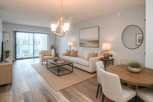 Staged living room at 130 Cypress Club Dr #324, Pompano Beach
